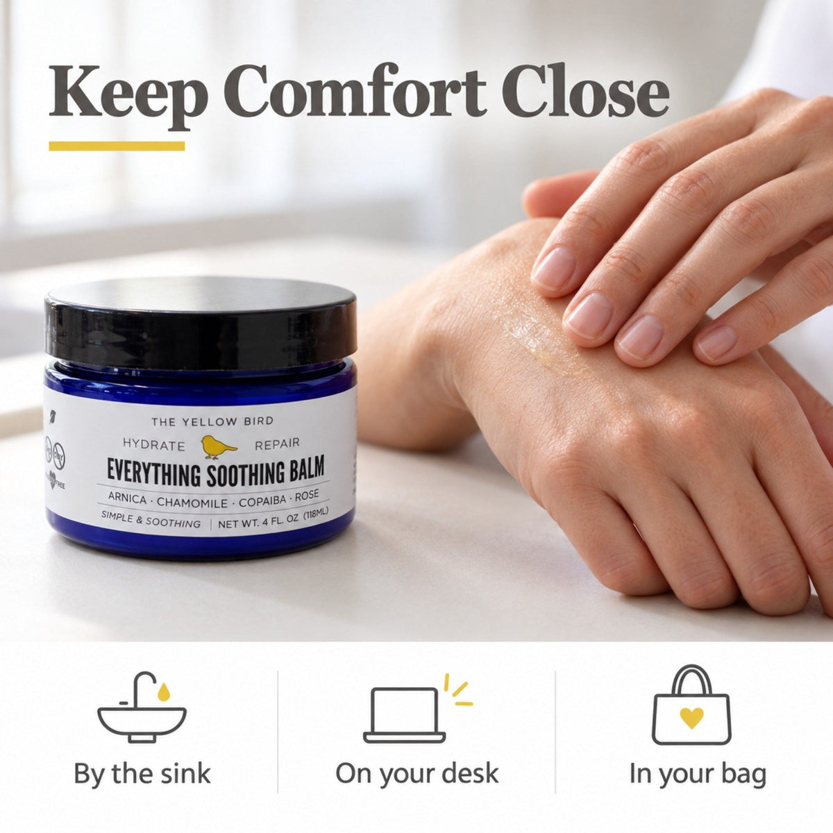 Woman applying Everything Soothing Balm to the back of her hand next to the blue jar