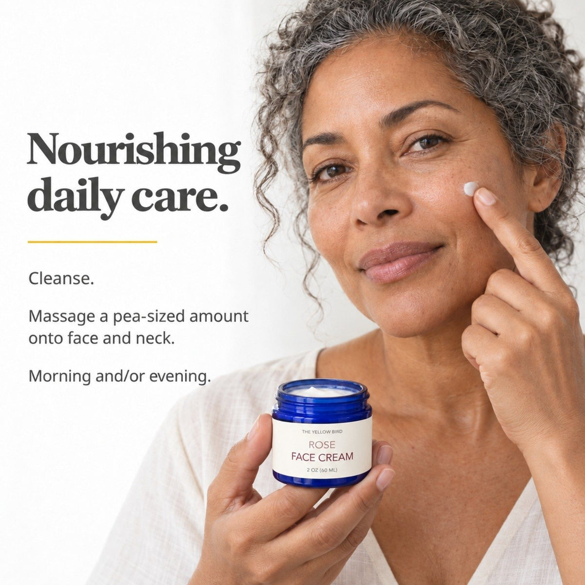 Woman applying Rose Face Cream to her cheek, showing how to use it by The Yellow Bird